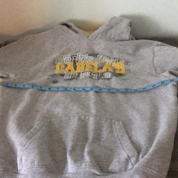 Cabelas hooded sweatshirt says “Worlds Formost Cabela’s Outfitter size XL - Picture 10 of 11